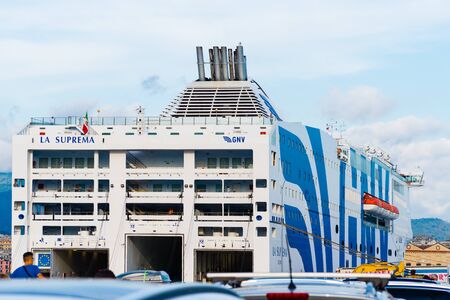 Genoa, Italy â 11 August 2018 : Long line of cars waiting to board a ferry to go on summer vacationのeditorial素材