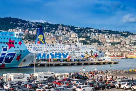 Genoa, Italy â 11 August 2018 : Long line of cars waiting to board a ferry to go on summer vacationのeditorial素材