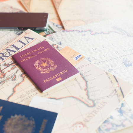 Milan, Italy â€“ July 20, 2018 : An Italian and brasilian passports and a smartphone over a...