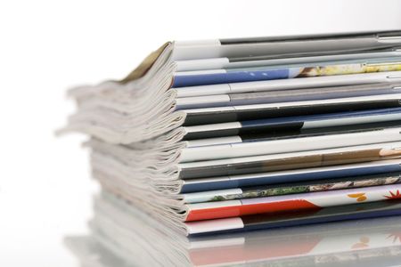 closeup pile of magazinesの写真素材