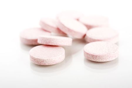 closeup effervescent tablets on whiteの写真素材