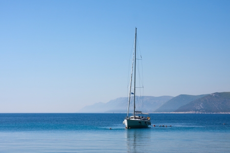 sail boat and people in sea near Dubrovnik, Croatiaの写真素材