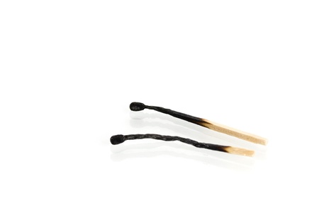 burnt matches isolated on white backgroundの写真素材