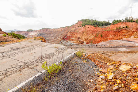 Road collapses with huge cracks. Damaged Road. Asphalt road collapsed and fallen. Erosion