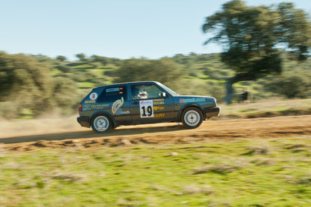 RIOLOBOS, SPAIN - April 12, 2011: Rally on gravel held on the paths of the pasture of the town of Riolobos. Extremadura Northland Rallyのeditorial素材