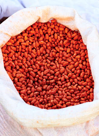 Detail of a sack of red kidney beans sold in bulk at street markets and grown in local orchards
