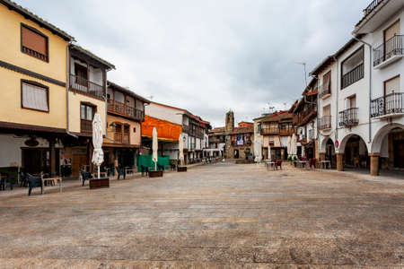 Villanueva de la Vera, Spain - March 08, 2021: The square of the sculptor Aniceto Marinas, example of the typical and traditional architecture of the townのeditorial素材