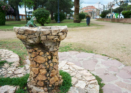 Plasencia, Spain - April 02, 2021: Famous frog fountain in the frog park or park of the fallenのeditorial素材
