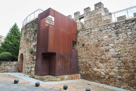 Plasencia, Spain - April 02, 2021: Modern rusty iron structure that houses the stairs to access the...
