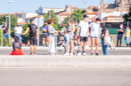 Fitness athletes pedaling their bikes during a national Triathlon, swimming, cycling and running events.のeditorial素材