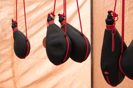 Several wineskin bottle, hanging wine boots for sale.の写真素材