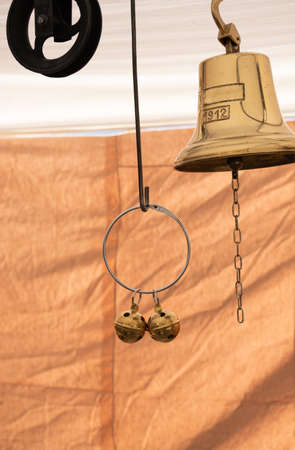 A bronze bell and jingle bells