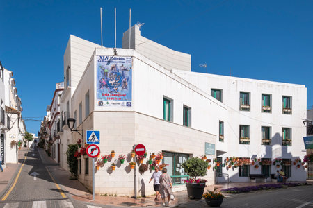 Estepona, Malaga, Spain - June 07, 2022: Typical Andalusian street decorated with pots and flowers in Estepona, Costa del Sol, Spainのeditorial素材