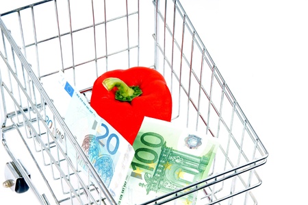 shopping cart with vegetablesの写真素材