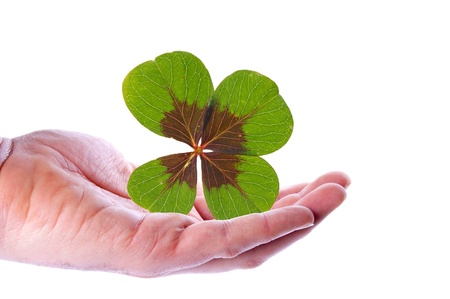 Hand with a lucky clover