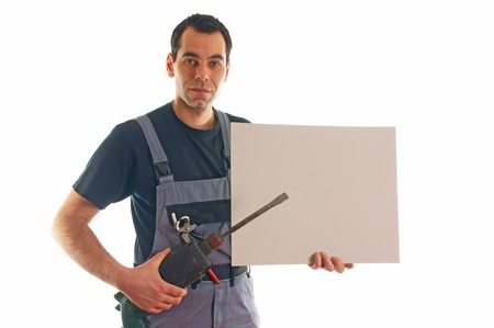 Craftsman with drill and billboardの写真素材