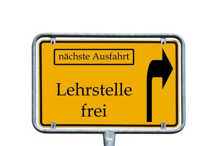 sign with the german words next exit and Teaching vacancyの写真素材