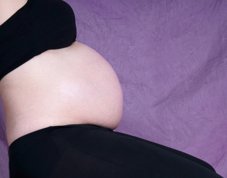 pregnant woman with bare belly