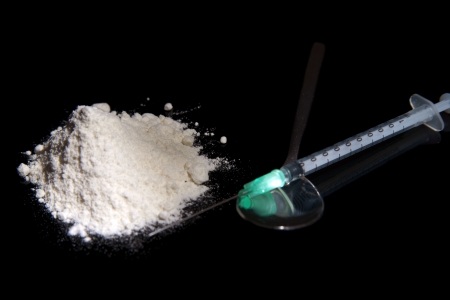 Cocaine, syringe and spoon