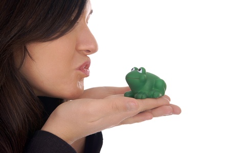 pretty woman kissing a frogの写真素材