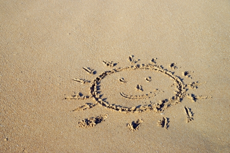 Beach with a painted sunの写真素材