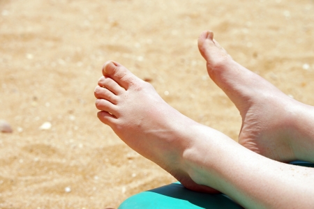 Feet on the beachの写真素材