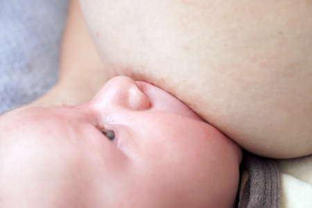 Breastfeeding with breast milkの写真素材