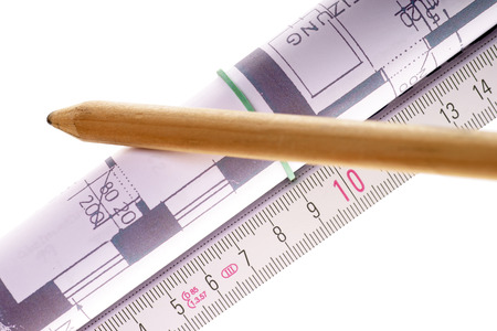 Architectural drawing with a folding rule and pencilの写真素材