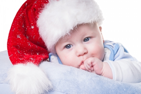 Baby with Santa Hat over a white backgroundの写真素材