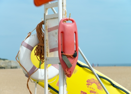 Dan buoy with life buoy on the beachの写真素材