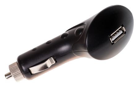 USB charging adapter isolated over a white の写真素材