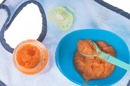 Baby food in a porridge bowlの写真素材