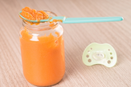 Baby food in a glassの写真素材