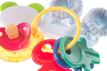 Baby toy with teether and baby shoes