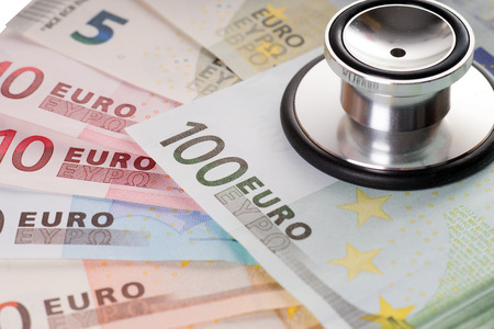 Euro banknotes and stethoscopeの写真素材
