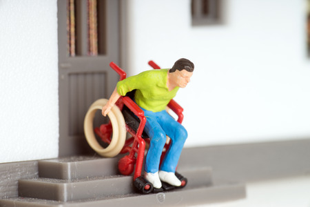 Wheelchair user on an exterior staircase
