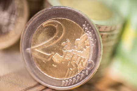 Euro coins with euro banknotesの写真素材