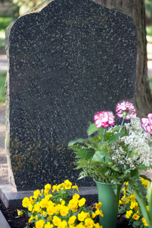 Grave stone in a cemeteryの写真素材
