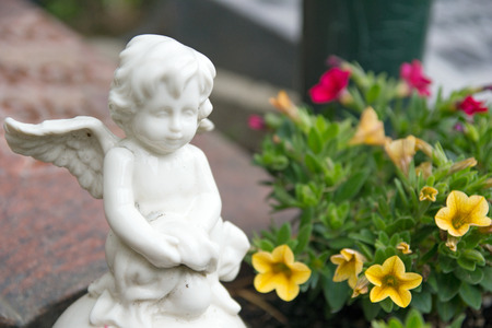 little Angel on a cemeteryの写真素材