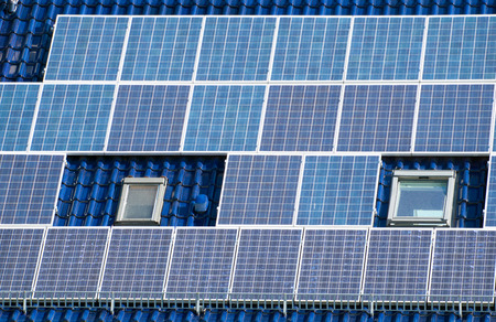 Solar panels on a house roofの写真素材