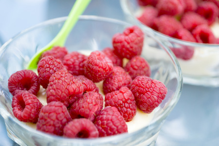 Raspberries with puddingの写真素材