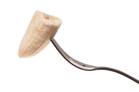 Banana on a forkの写真素材