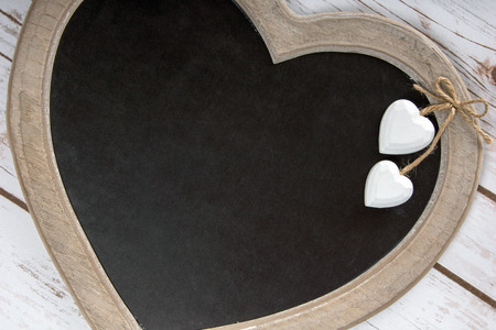 Wooden panel in heart shapeの写真素材