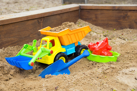 Sand toys in a sandboxの写真素材