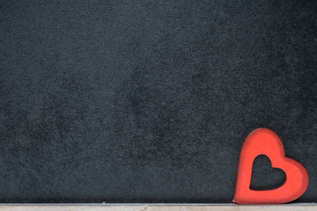 Blackboard and little red heartの写真素材