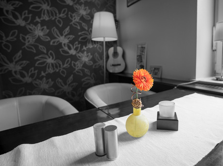 Flower in a vase placed on a tableの写真素材