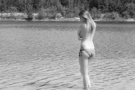 pretty woman in blue bikini slipの写真素材