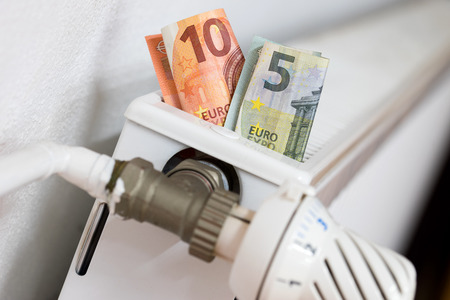 Radiators with euro banknotesの写真素材