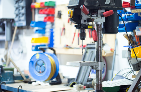 Workshop with drill and a lot of tools