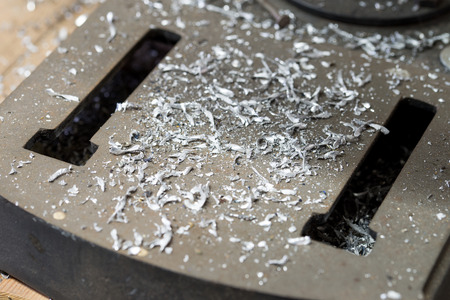 Many metal shavings on a metal baseの写真素材